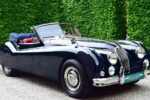 Jaguar XK140 DHC 2026 deportivo híbrido 3.0L con pantalla oculta de 10 e interiores de cuero premium